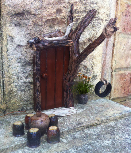 Fairy Door with a tyre swing.