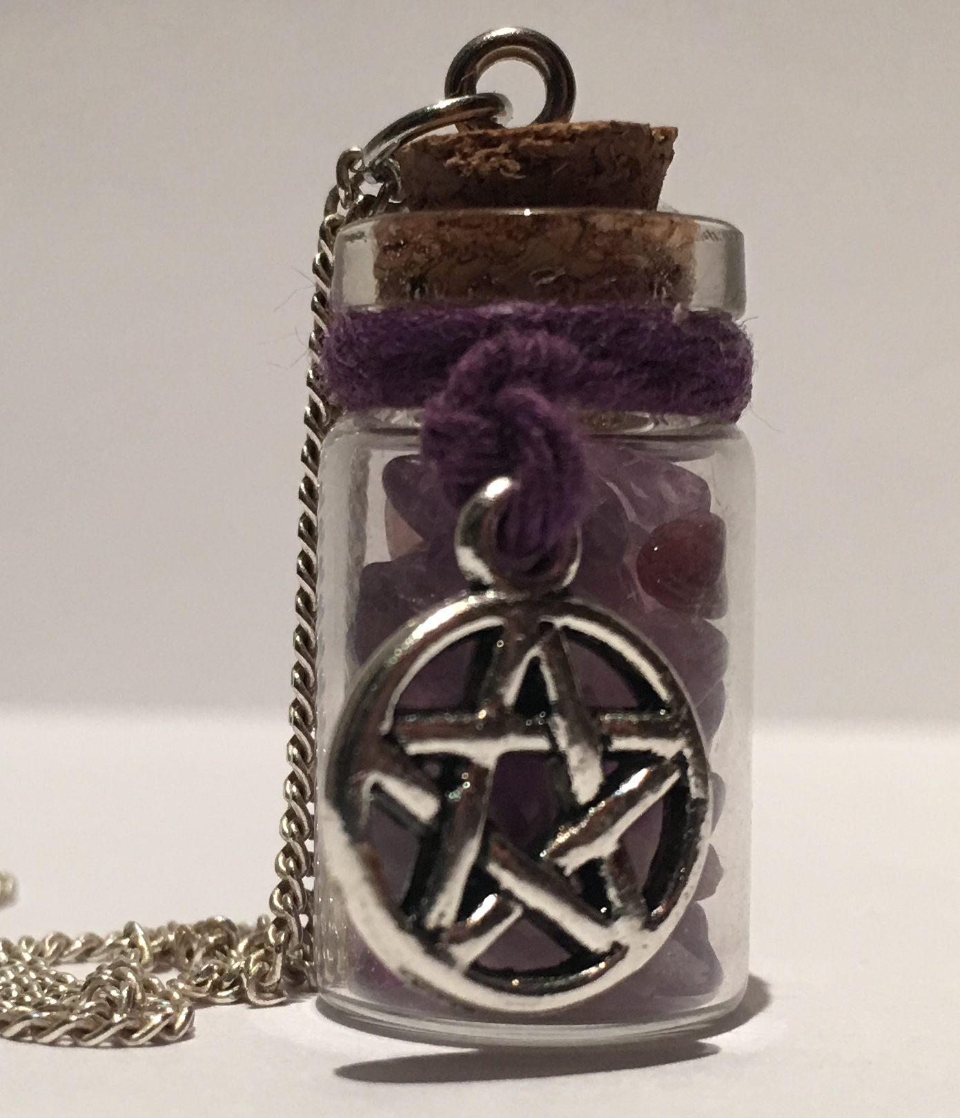 Purple hemp twine with amethyst and rose stones.