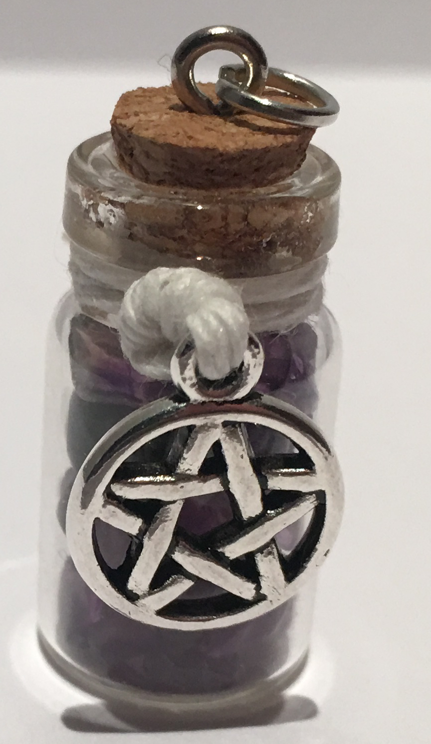 White hemp twine with amethyst stones.